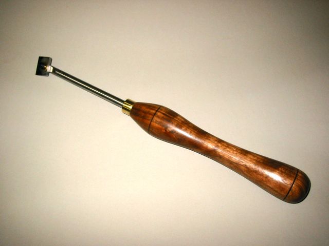 Adjustable scraper